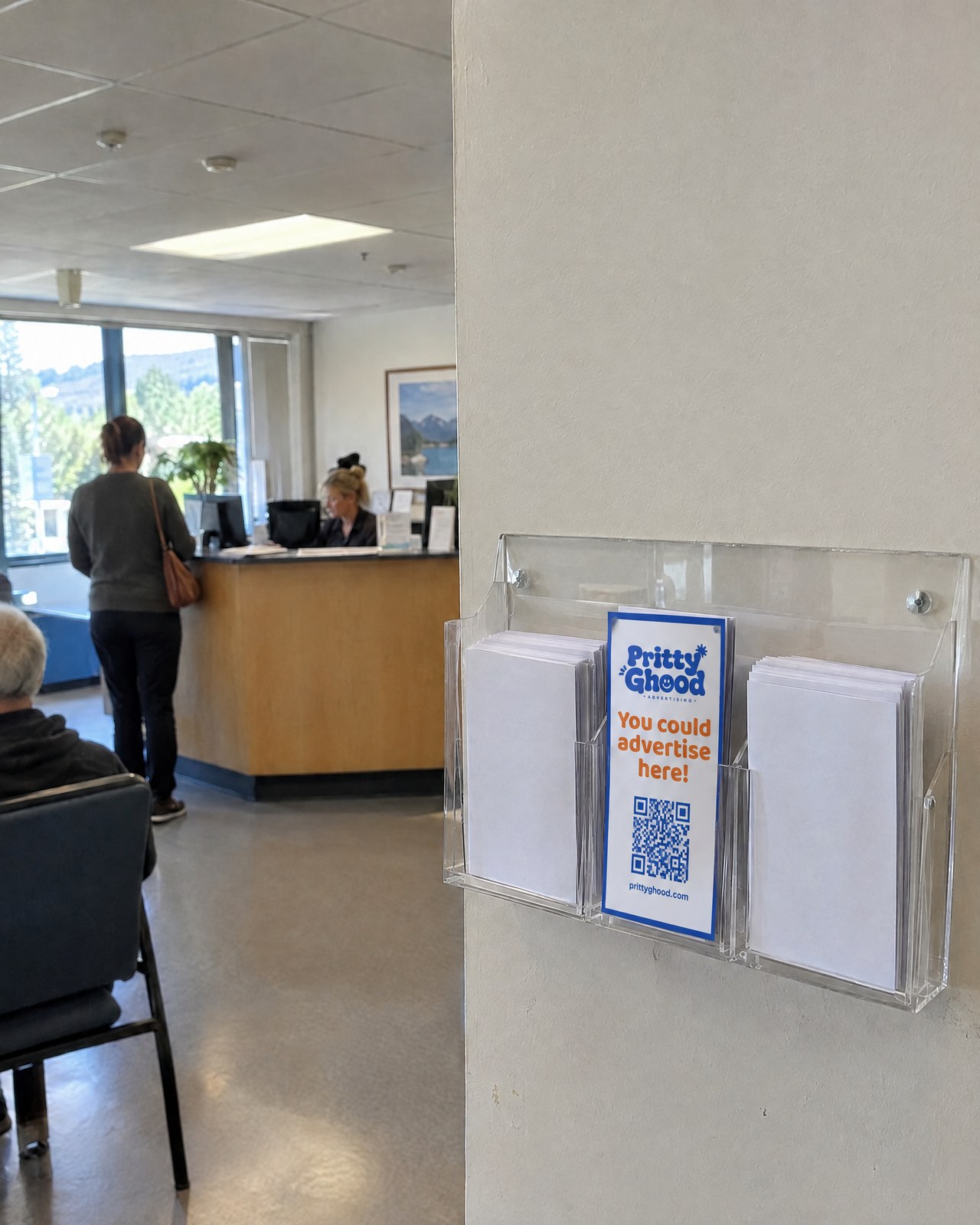 A Pritty Ghood DL flyer in a medical centre brochure stand